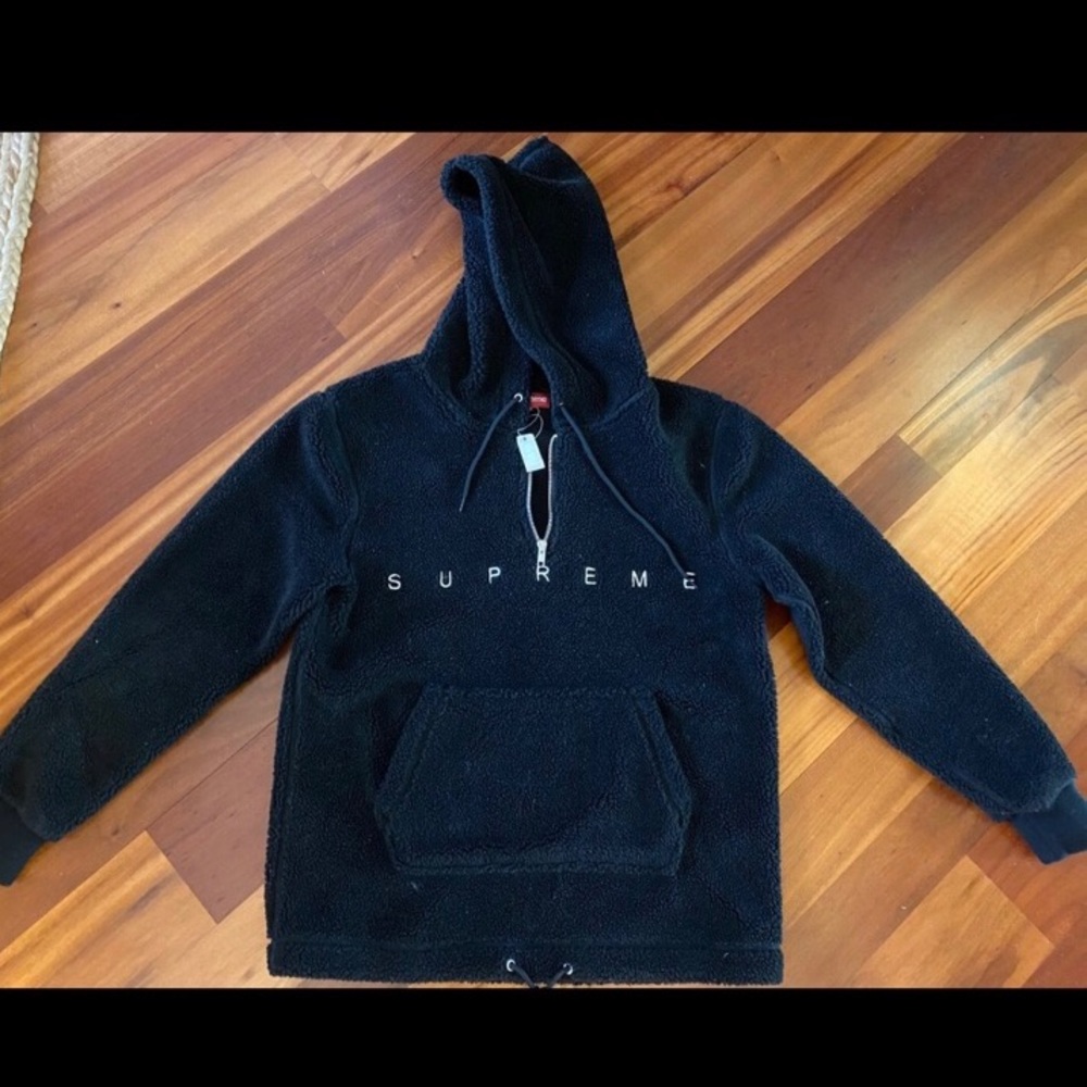 fuzzy black supreme quarter zip